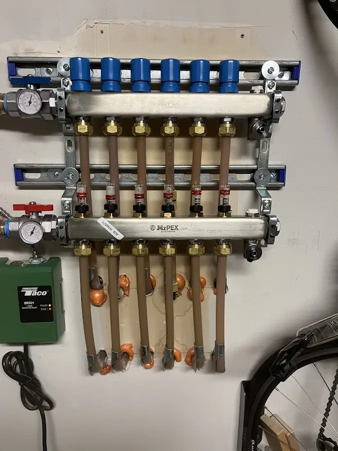 Plumber performing Water Heater Repair at a residential property in East St. Louis